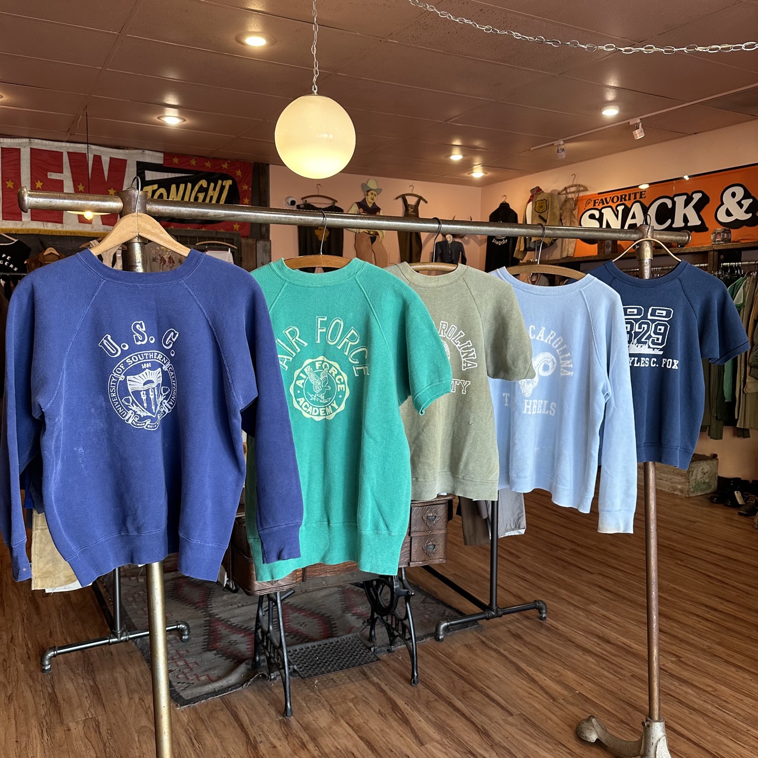 Three black embroidered vintage Western shirts displayed inside Gator's Vintage.